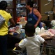 Families stock up on goods at a New York City food pantry. (Spencer Platt/Getty Images)